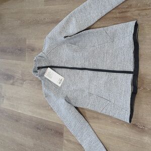 Brand new with tags Lulu lemon insculpt jacket. Gray size 8